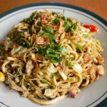 Savor the Sizzling and Spicy Fried Noodles in Abu Dhabi